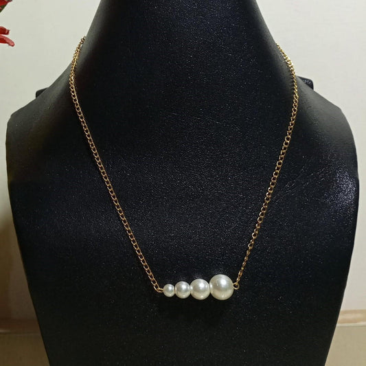 Golden Necklace With Hanging Pearl Pendent